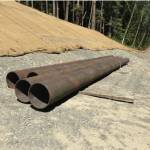 Pictured above are a portion of the pipe piles that were delivered last week in preparation for pile driving this week.