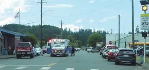 The Forks Ambulance crew responds to an injury outside the Forks Post Office on Tuesday just after noon. Photo Christi Baron