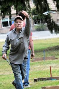 Floyd McCoy throws a ringer during the championship horseshoe game played Saturday at Tillicum Park. The team of McCoy and Dalton Kilmer defeated Wade McCoy and Troy Pearce for first place. Photo by Lonnie Archibald