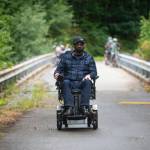 Commissioner Bill Peach riding past the Sol Duc River. Photo Jesse Major