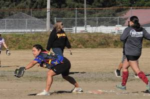 NADS first baseman Michelle Ward stretches to take the throw for the out as NADS defeated Hit For Brains 10-9 in a thriller Saturday. Photos by Lonnie Archibald