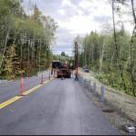 Driving the posts for the guardrail at the approaches to the Canyon Creek bridge, MP 10. Photos FHWA