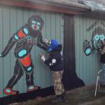 Recently Tom Sewid and Peggy Seaview created native-inspired paintings outside the recently opened Sasquatch The Legend store on Forks Avenue. Photo Christi Baron
