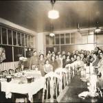 Ted and Rose Heyder once managed the hotel, restaurant, and bar. Here staff and maybe guests gathered for a photo in the restaurant on the bottom floor sometime in the 1930s.