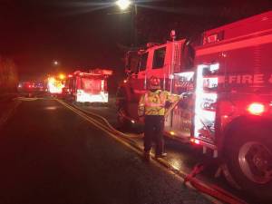 Mutual Aid Response to fire
Clallam County Fire Protection Dist. #1, Forks and Beaver, and firefighter Bill Wilkins with the La Push Fire Department all responded to this single-wide mobile home fire in the 600 block of Calawah Way last Tuesday night. As they happened to be training that evening it was a quick response involving Engines 91 and 92 and Engine 71. The fire damaged the living room and a bedroom and heat and smoke damage were present in the rest of the mobile home which, Fire Chief Bill Paul said was a total loss. Photo CCFPD#1