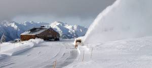 Snow blower clearing the Hurricane Ridge Visitor Center parking lot. NPS Photo