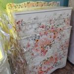 Offering new and repurposed painted furniture with a mixture of decoupage and other artistic details. Photo Christi Baron