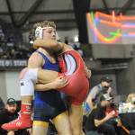 Spartan Dalton Kilmer (left) placed third at State in the 126 lb class.