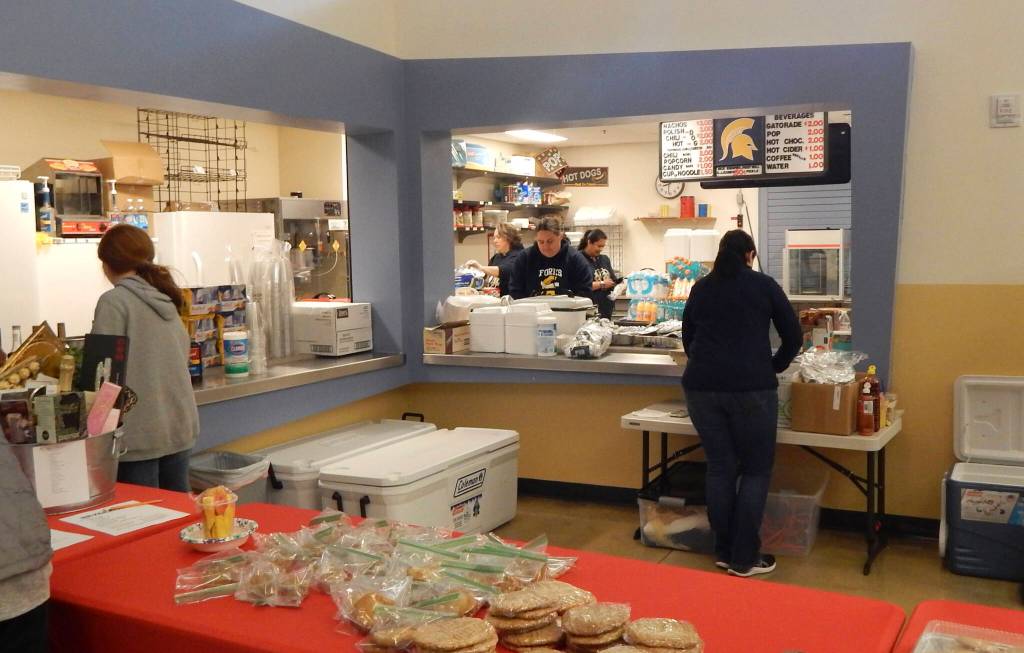 Below: A rare lull at the senior parents concessions …the food was amazing!