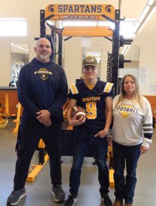 Spartan football coach Trevor Highfield, Dalton Kilmer, and his mom Alissa Kilmer. Photo Christi Baron