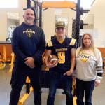 Spartan football coach Trevor Highfield, Dalton Kilmer, and his mom Alissa Kilmer. Photo Christi Baron