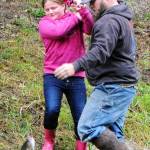 Brynlee Rigby age 8 gets a little help from dad while landing this good-sized trout.