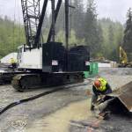 ICI subcontractor preparing equipment for temporary sheet pile shoring.