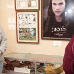 Before the celebration outside the collection, Andros met with Pokey Woodruff alongside a case of Quileute items recently added to the collection. Woodruff had suggested the items to Andros and they were purchased a few months ago. Photo Christi Baron