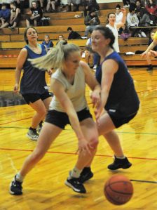 Spartan Kadie Wood drives against the Loggers.