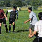 Not to be confused with the Red Dragons, the 10 to 14-year-old Dragons were having fun in the sun as they prepared for the soccer season. Photo by Lonnie Archibald.