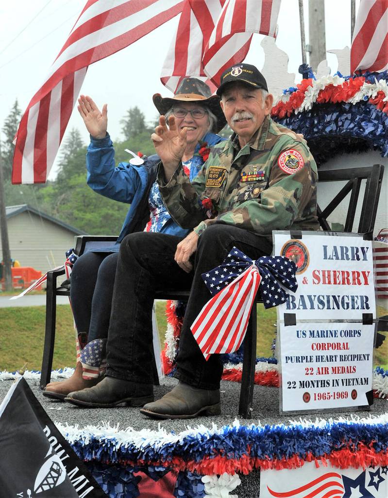 Larry and Sherry Baysinger were the Hometown Heroes for the 2022 Forks Old Fashioned 4th of July parade and rode aboard the float down Forks Avenue. Larry is a Vietnam Veteran, VFW member, and Purple Heart recipient. He and Sherry also donate their time to the Back Country Horseman Association and work to maintain backcountry trails so that all can enjoy them. Photos by Lonnie Archibald