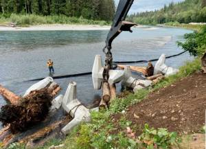 ICI constructing an Engineered Log Jam at MP 4.