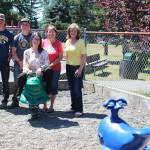 Above, Soroptimist International of the Olympic Rainforest Economic and Social Development Committee members Sarah Hanson (trying out the new frog), Sharla Fraker, and Elena Friesz (standing behind) with City of Forks Public Works employees (summer crew) Landin Davis and Kaleb Blanton. Not pictured are Public Works employees Mike, Brett and Ryan who were going to do the photo but had a concrete truck arrive at the same time! Photo Christi Baron