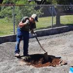 Public Works employee Mike Hirsch prepares the area for the new equipment. Submitted photo