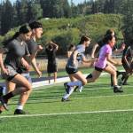 Even with the temperatures still in the 80s Forks High School soccer players were off and running at Spartan Stadium on the evening of July 28. Photo by Lonnie Archibald
