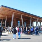 The fog stays at bay along the tree line as Quileute Tribal School Blessing attendees file into the school to take a tour of the new facility at La Push.