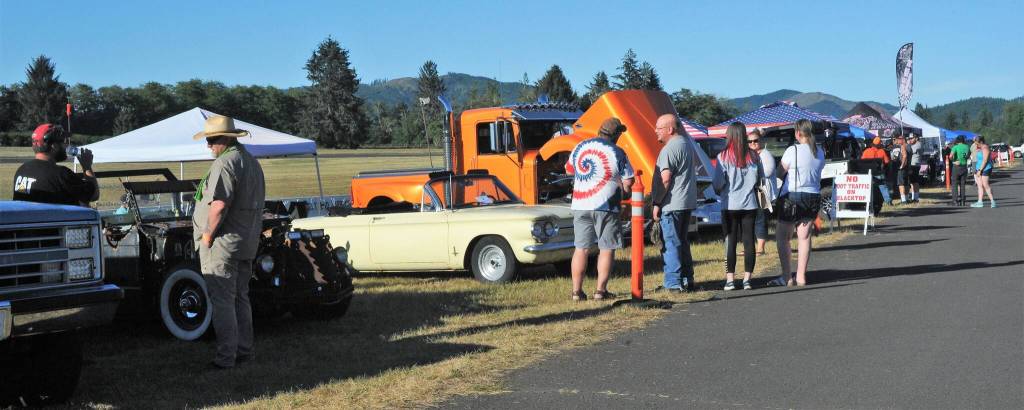 Visitors look over a few of the Show N Shine vehicles during the Hot Thunder Nites by West End Thunder Racing. Photo by Lonnie Archibald