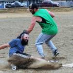 Dayne Brown of Team Gramps was called safe at third as Mossquatch third baseman David Hurn made the tag. Gramps took this contest 21 to 11.