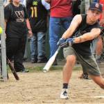 Team Gramps hitter Logan Olson connects against the Forks Merchants. The Merchants took this contest 15 to 8. Team Gramps made a comeback, however, to place second in the tournament.