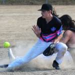 Hit For Brains runner Conner Ferro-May slides safely into second covered by Elandon Washburn of the Master Batters. Master Batters took this one 6 to 3.