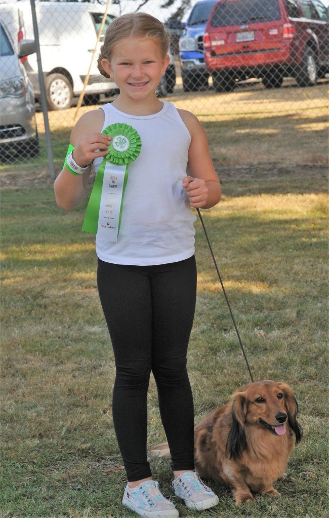 Sophie Davis and Dixie with the Best In Show ribbon.
