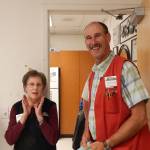 Outfitters, owner Bruce Paul, led a surprised Linda Arbeiter into the Breakroom at the store last Friday. Photos Christi Baron