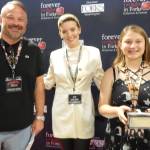 A dad and daughter with Maggie Grace. This dad said what made him happy was the smile on his daughters face. Photos Christi Baron