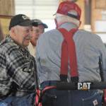 Joe Dahlgren (left) reacts to a tale of logging and trucking. It was 1952 just after the Forks fire of 51 that Joe and his family moved from Everson, WA to Forks to salvage the giant but dying evergreens left by the fire.