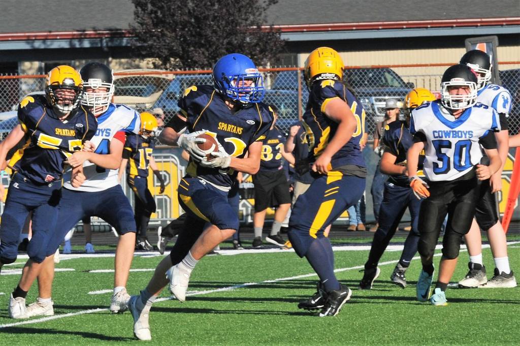 Spartan Malachai Rowley en route to a touchdown after an interception of a Blue Heron pass.