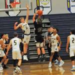 Titus Rowley (30) defends against the Wolves. Also from the left are Spartans Cashtein Barajas, Malachai Rowley, Emanuel Hernandez, and Estevan Ramos.