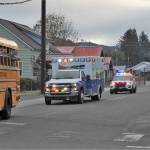 Forks 6th graders were out to support the girls as the Forks High school volleyball team turned down Spartan Avenue en route to Yakima Wednesday, Nov 9. Community well-wishers also lined Forks Avenue providing a great send-off as the Spartans headed to state for the first time in almost 20 years. Photo by Lonnie Archibald
