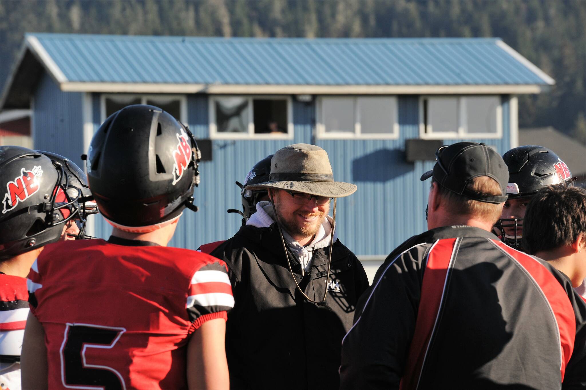 Red Devil head coach Kane Bachelor converses with assistant coach Tony McCaulley (back to camera) during Neah Bays victory over Wellpinit on November 19 in Forks. Neah Bay, after their 66 to 14 win over Wellpinit, moved on to Tacoma to defeat Liberty Christian 82 to 24. The Red Devils will face Liberty Bell of Winthrop as they return to Mt Tahoma High School Saturday, Dec. 3 at noon for the 1B state championship game. Photo by Lonnie Archibald