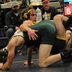 Spartan Walker Wheeler (top) defeated Abrams of Port Angeles 11 to 6 in the 152 lb class.