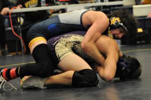 Spartan Mathew Montes defeated Beauregard of Sequim 9 to 0 in the 113 lb class. Photos Lonnie Archibald