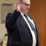 Bruce Hanify takes his oath on Wednesday for his position as District Court 2 Judge. (Keith Thorpe/Peninsula Daily News)