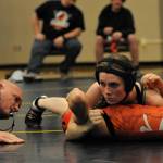 Spartan Miley Blanton pinned Anna Abott of Kalama in the 125 lb bracket.