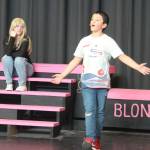 FHS drama director Tracy Gillett said, This is the first performance in 3 years. We havent performed since The Addams Family Musical in the 2018-2019 school year. We are so excited to perform. Gillett is being assisted by co-drama director Kenneth Turner. Seen here are cast members, Elle Woods played by Aliya Gillett (10th grade), and Emmett Forrest played by Justin Sandoval (7th grade).