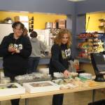 Spartan senior moms Shellie Lohneis and Shannon Damron keep the goodies stocked at the senior parents concessions during the auction. Photo Christi Baron