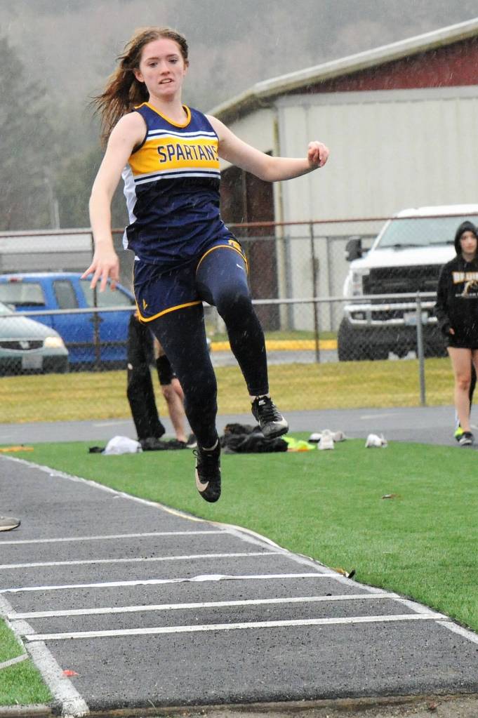Aliya Gillett in the triple jump. Photo by Lonnie Archibald