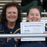 Superintendent Diana Reaume with Cindy Spade. The ticket booth was dedicated to Spade in recognition of her working the old booth for the past 44 years. Photo Kim Weissenfels