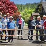 Members of the OOS gather behind the Cowan Farm gate after an afternoon of work. Submitted photos
