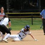 Spartan Kadie Wood steals second against Rainier who Forks defeated 6 to 2.