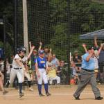 Spartan Chloe Gaydeski-St. John rounds first with her home run over the left field fence against Adna.