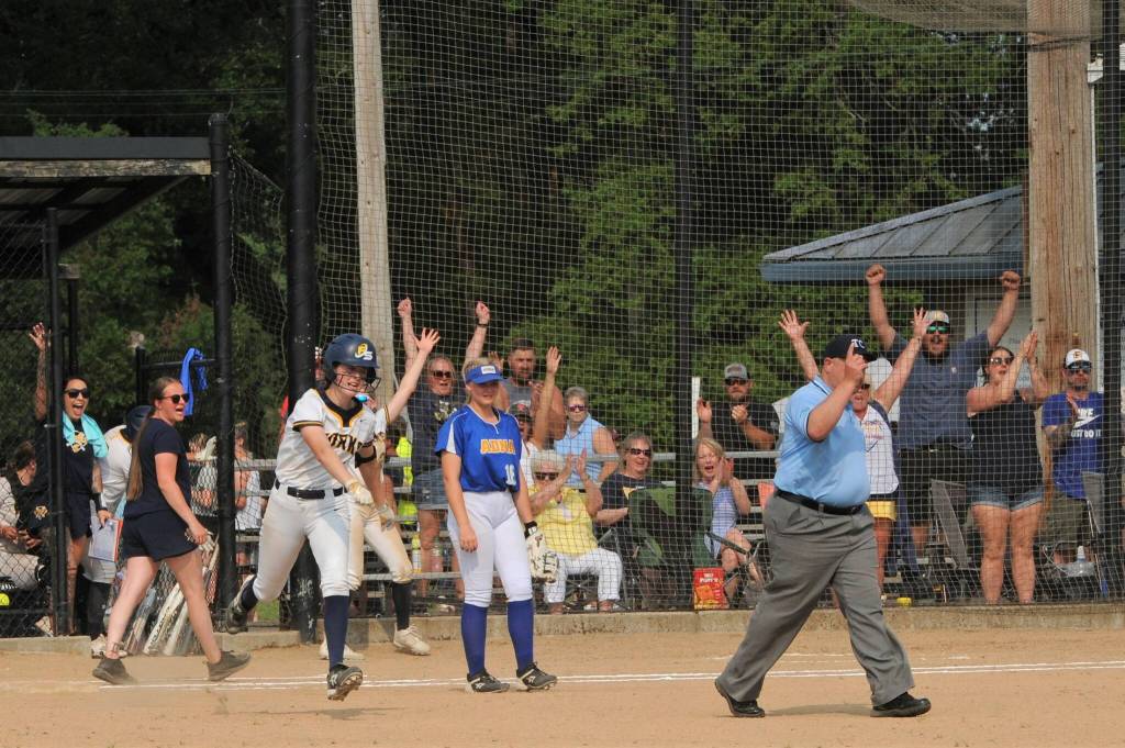 Spartan Chloe Gaydeski-St. John rounds first with her home run over the left field fence against Adna.